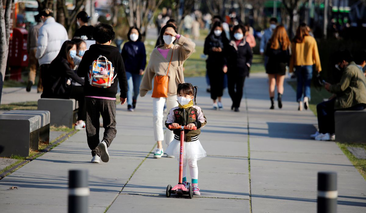 Girl wearing a protective face mask